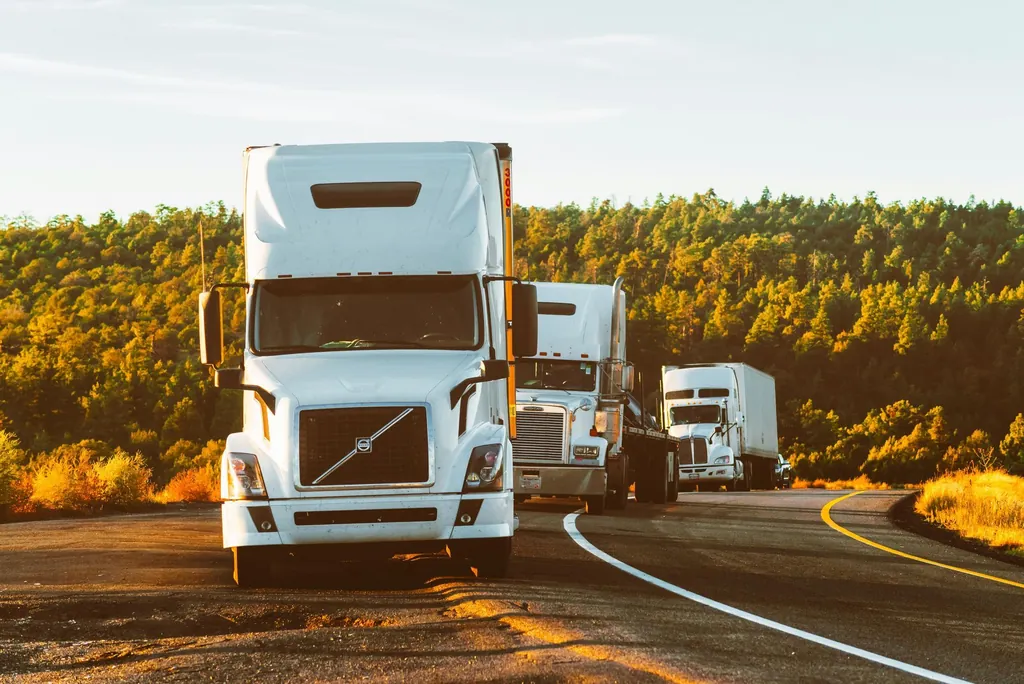 Semi trucks on a highway, representing CDL traffic violations